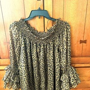 Women’s Leopard Blouce size XL. Off or on shoulder style. Worn once.